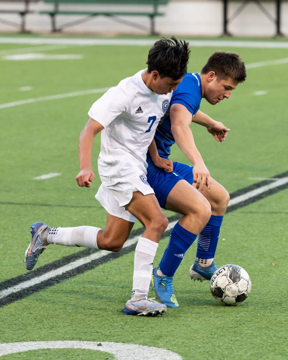 Georgetown's Martin Valdes, left, and McCallum's Gus Ehlers battle for the ball Thursday in the Eagles' 3-1 victory. "He’s got a little (Michael) Jordan in him as he hates to lose in anything," Georgetown coach Jason Rich said of Valdes, who had a hat trick.