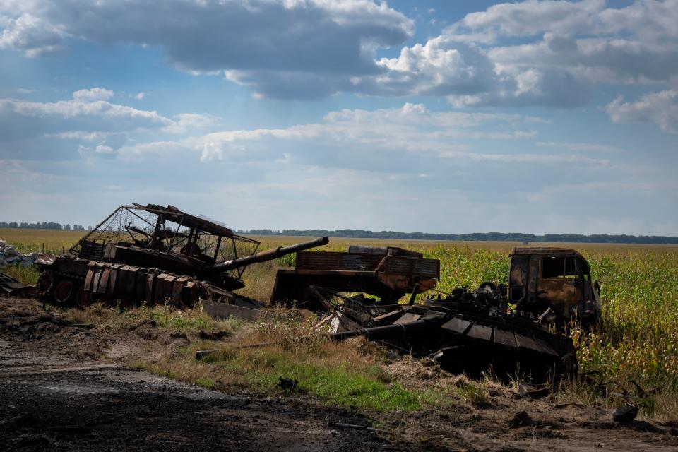 Destroyed Russian tanks lie on a roadside near Sudzha, in the Kursk region, on August 16.