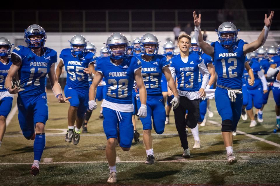 Poudre Impalas football players celebrate their 40-0 win over the Monarch Coyotes at French Field in Fort Collins, Colo. on Friday, Sept. 23, 2022.