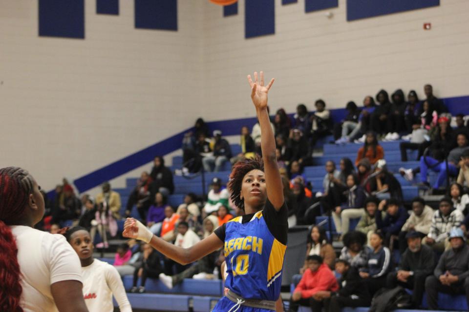 Mariah Reid of Beach drives to the basket in a game at Johnson on Jan. 5, 2024.