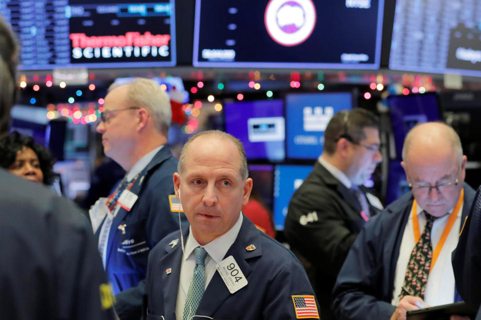 Traders work on the floor of the New York Stock Exchange shortly after the opening bell in New York, U.S., December 5, 2019.  REUTERS/Lucas Jackson