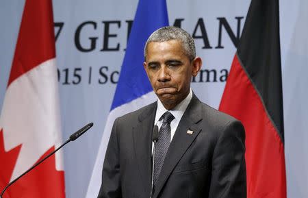 U.S. President Barack Obama pauses while holding a news conference at the conclusion of the G7 Summit in the Bavarian town of Kruen, Germany June 8, 2015. REUTERS/Kevin Lamarque