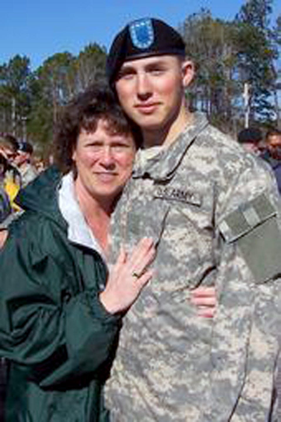 U.S. Army Spc. Zachary Clouser and his mom, Deb Etheridge, pose during a visit home over the Easter holiday.