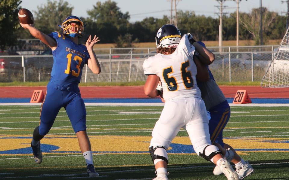 Aberdeen Central quarterback Dustin Hermanson tosses a pass downfield during a game against Tea earlier this season. The Golden Eagles look for their first victory Friday night against Mitchell.