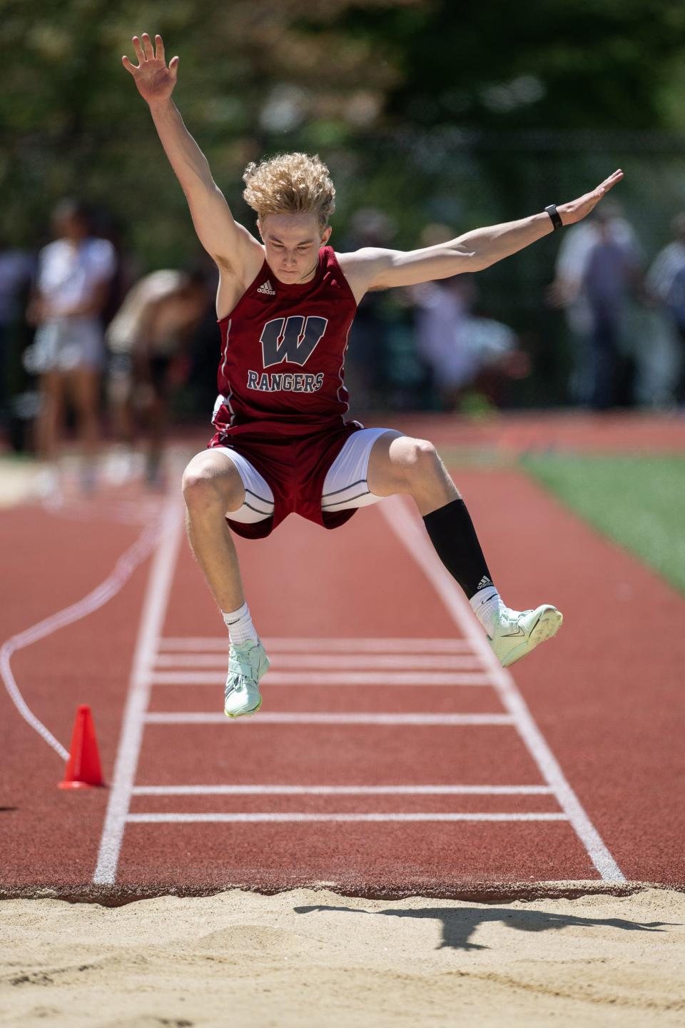 Westborough senior Zach Veiby competes in the long jump during Saturday's District E Division 1 Class Championships.