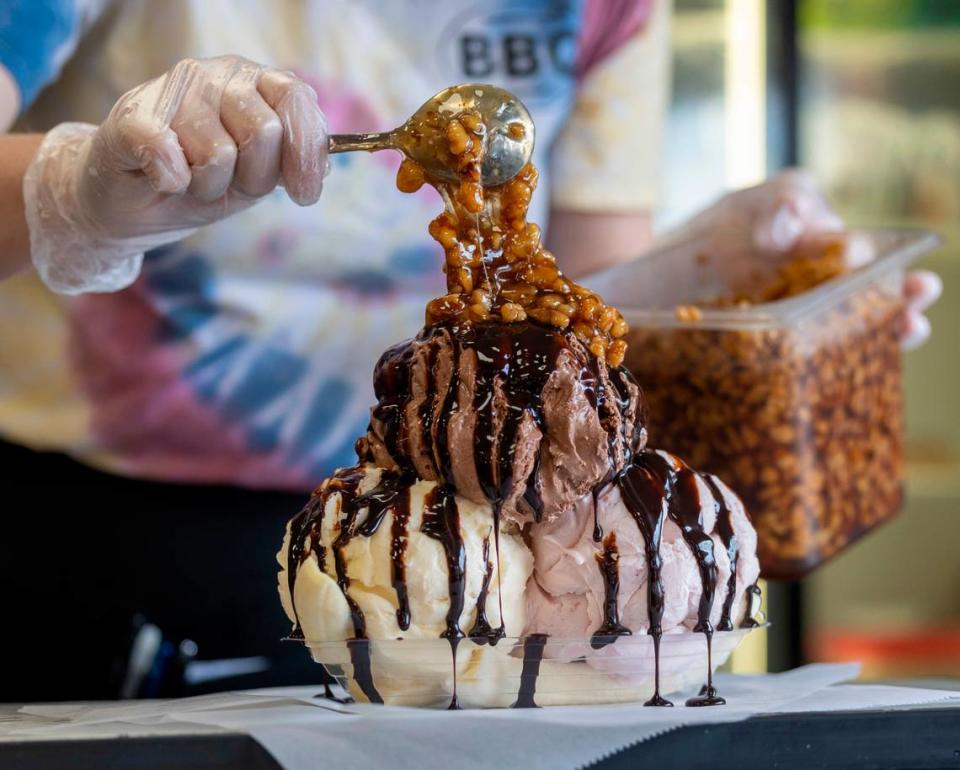 C.J. Nelson prepares a banana split at Bar-B-Q Center restaurant on Tuesday, October 10, 2023 in Lexington, N.C. 