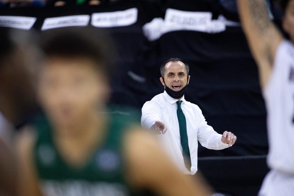 Northwest Missouri Head Coach Ben McCollum directs his team from the sidelines during the championship game against West Texas of the NCAA DII Elite Eight men's basketball tournament at Ford Center in Evansville, Ind., March 27, 2021.