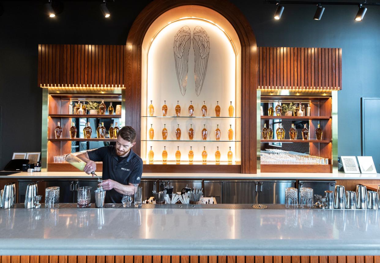 Cocktail specialist Mike Bohn mixes a drink in the Toasting Bar, one of the new features at Louisville bourbon distiller Angel's Envy. The distiller is expanding to meet the demand of its products and interest in touring its facility. June 8, 2022