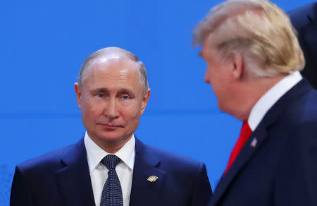 U.S. President Donald Trump and Russia's President Vladimir Putin are seen during the G20 leaders summit in Buenos Aires, Argentina November 30, 2018. REUTERS/Marcos Brindicci