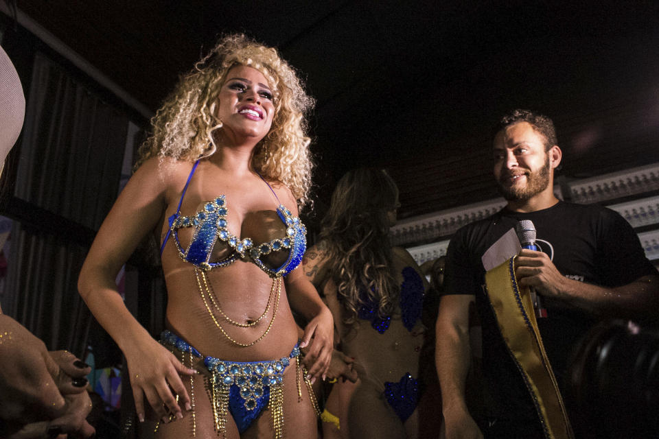 SAO PAULO, BRAZIL - NOVEMBER 09: Erika Canela (C) of Bahia state cries after winning the Miss Bumbum 2016 contest which elects the woman with the best looking derriere in Brazil, on November 09, 2016 in Sao Paulo, Brazil. (Photo by Daia Oliver/Brazil Photo Press/LatinContent/Getty Images)