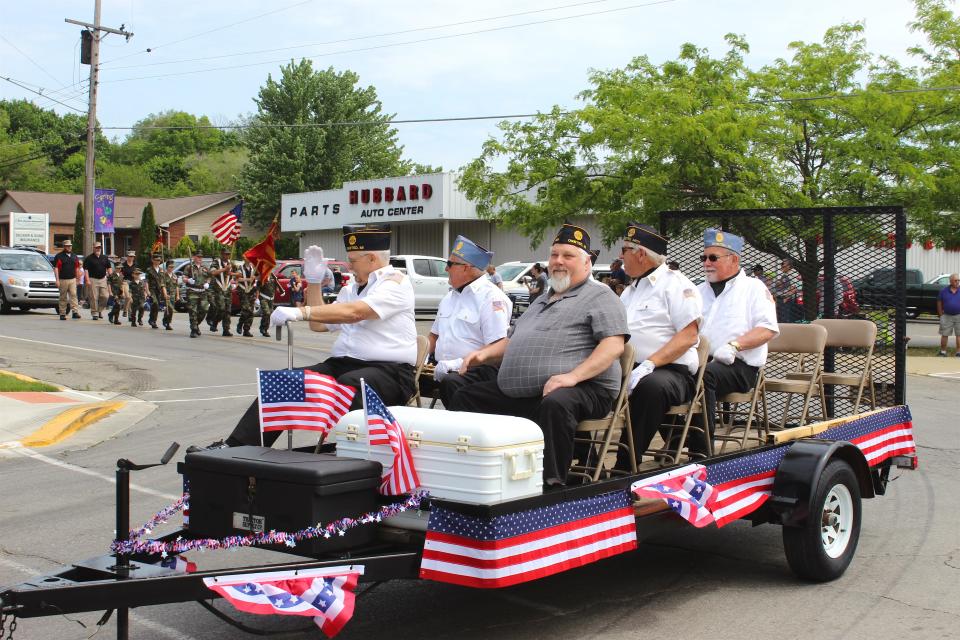 Members of the Onsted American Legion Durkee-Seager Post No. 550 and the Onsted American Legion Auxiliary ride in Onsted's Memorial Day parade, May 31, 2021.