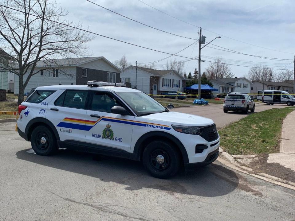 Police remain at the scene of a shooting on Logan Lane, Monday afternoon.  (Kate Letterick/CBC News  - image credit)