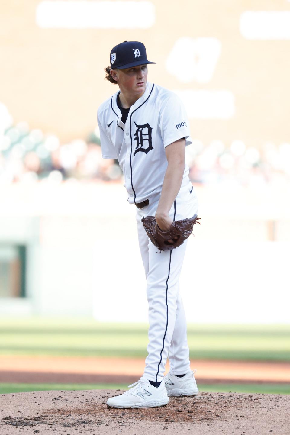 Apr 15, 2024; Detroit, Michigan, USA; Detroit Tigers starting pitcher Reese Olson looks over to first during the game against the Texas Rangers at Comerica Park.