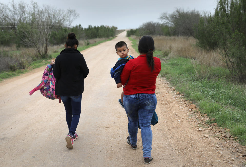 Two women and a child who crossed the border on Feb. 22, 2018, near McAllen, Texas.