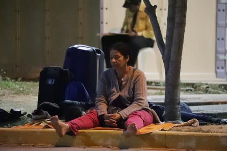 A Venezuelan migrant waits at the Binational Border Service Center of Peru in Tumbes