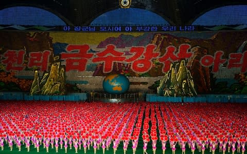 The Mass Games performed live in Pyongyang city of North Korea - Credit: Getty