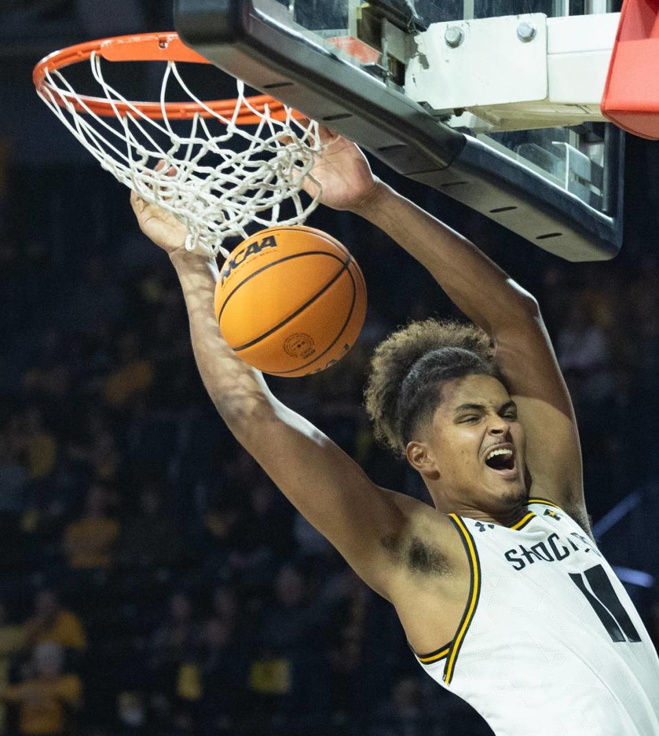 Wichita State’s Kenny Pohto dunks the ball against Lipscomb during the second half of their season opener on Monday night at Koch Arena. Travis Heying/The Wichita Eagle