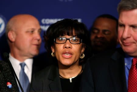 Flint, Michigan Mayor Karen Weaver (C) addresses the media at the opening press conference of the U.S. Conference of Mayors in Washington in this January 20, 2016 file photo. REUTERS/Gary Cameron/Files