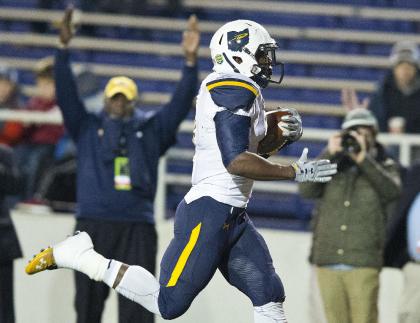 Toledo running back Kareem Hunt (3) runs in for a touchdown during the first half of the GoDaddy Bowl NCAA college football game against Arkansas State in Mobile, Ala. (AP Photo/Brynn Anderson, File)