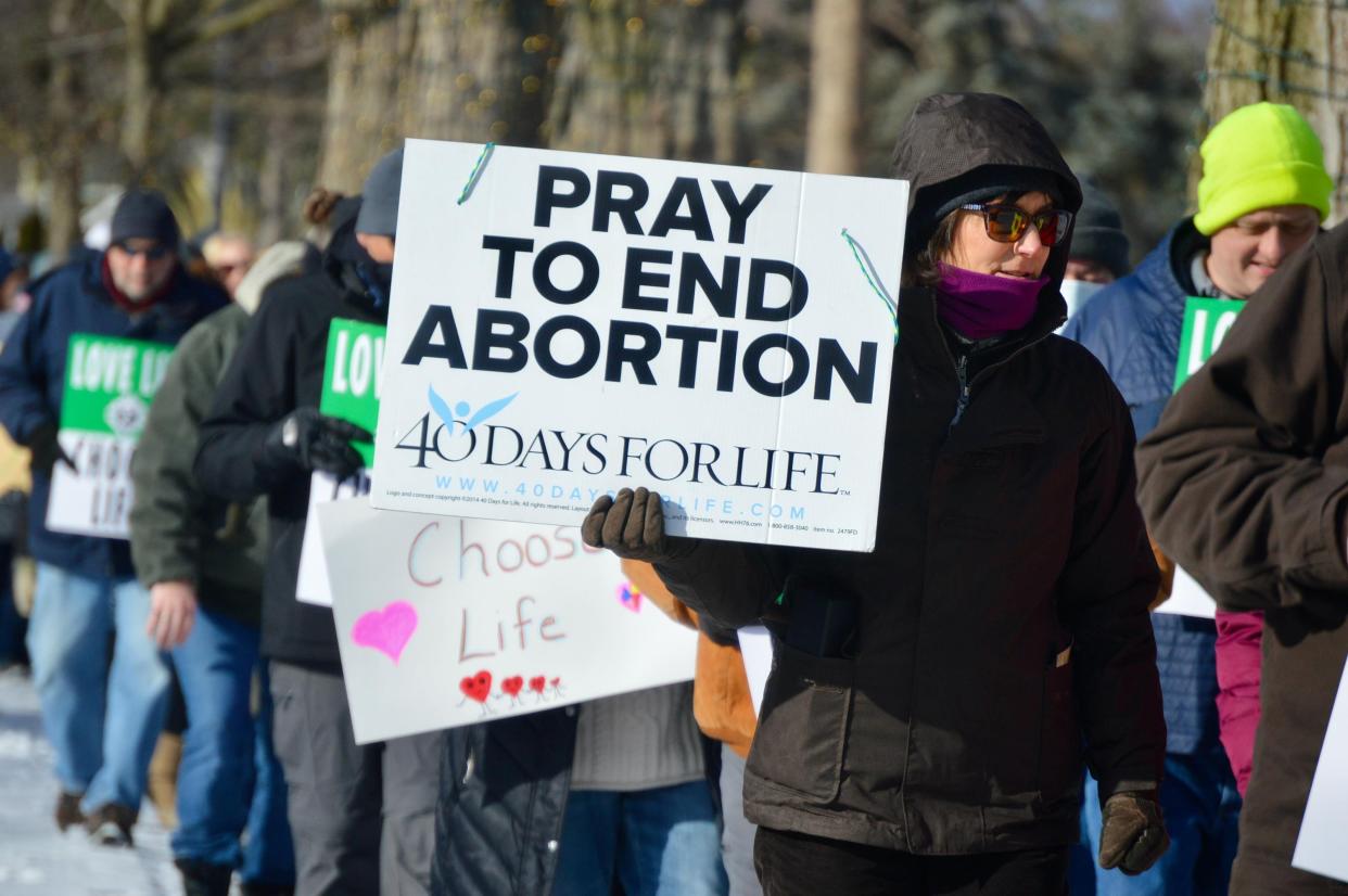 Right to Life of Holland supporters marched Saturday, Jan. 23, marking the anniversary of the 1973 Roe v. Wade decision which legalized abortion in the United States.
