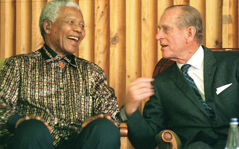 Former South African president Nelson Mandela and Prince Philip at Drakenstein Prison, Paarl about 50 kms outside of Cape Town, in 2000 -  ANNA ZIEMINSKI/AFP/Getty Images