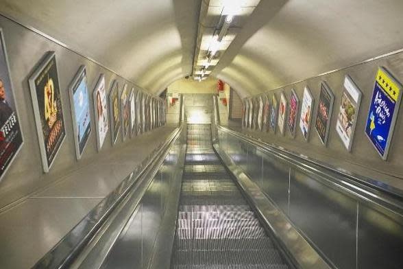 Deserted: A Tube station escalator looking deserted on Good Friday: jordiescoin