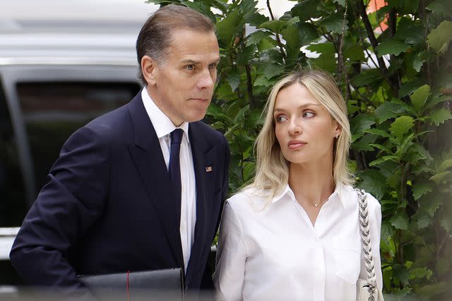 <p>Anna Moneymaker/Getty</p> Hunter Biden and wife Melissa Cohen Biden arrive to the Wilmington courthouse on June 11, 2024, hours before Hunter's conviction