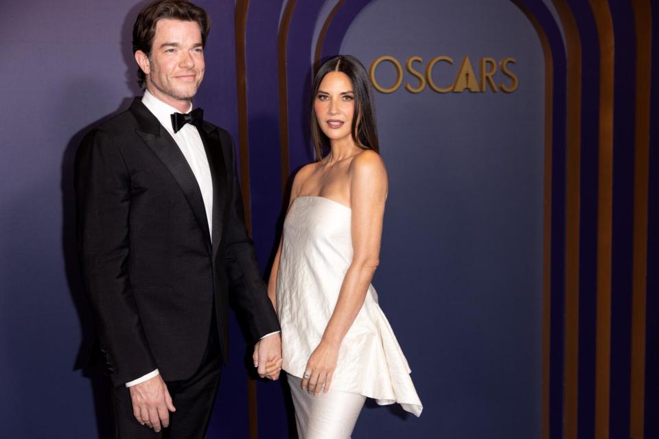 Governors Awards emcee John Mulaney and Olivia Munn on the red carpet.