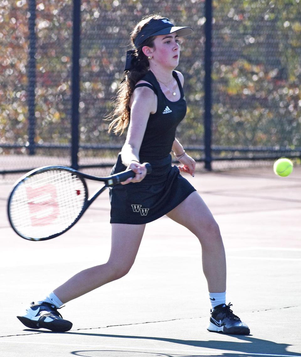 Western Wayne's Bella Kolp rips a forehand winner during Lackawanna League girls varsity tennis action at Honesdale.