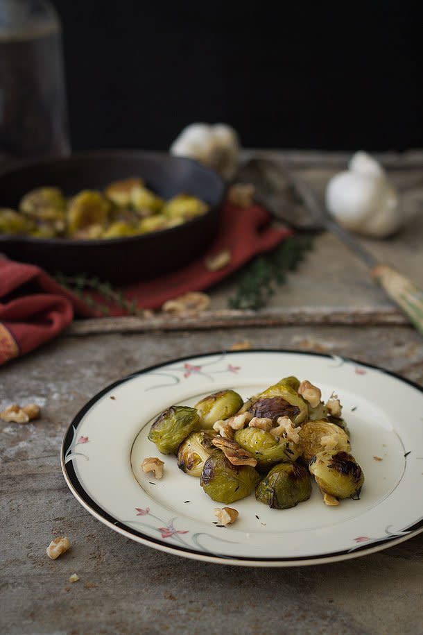<strong>Get the <a href="http://slimpalate.com/bacon-fat-roasted-brussels-sprouts-with-crispy-garlic-and-thyme/" target="_blank">Bacon Fat Roasted Brussels Sprouts with Crispy Garlic & Thyme recipe</a> by Slim Palate</strong>