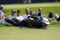 Xander Schauffele lines up his shot on the 11th green during the first round of the U.S. Open Golf Championship, Thursday, June 17, 2021, at Torrey Pines Golf Course in San Diego. (AP Photo/Marcio Jose Sanchez)