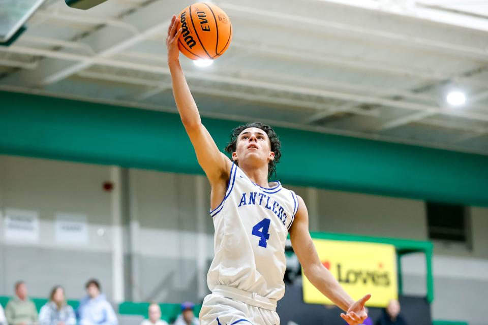 Deer Creek’s Clyde Davis, Jr. (4) lays up the ball during the Bishop McGuinness Boys Basketball Classic Tournament between Deer Creek and Casady in Oklahoma City, on Thursday, Jan. 4, 2024.