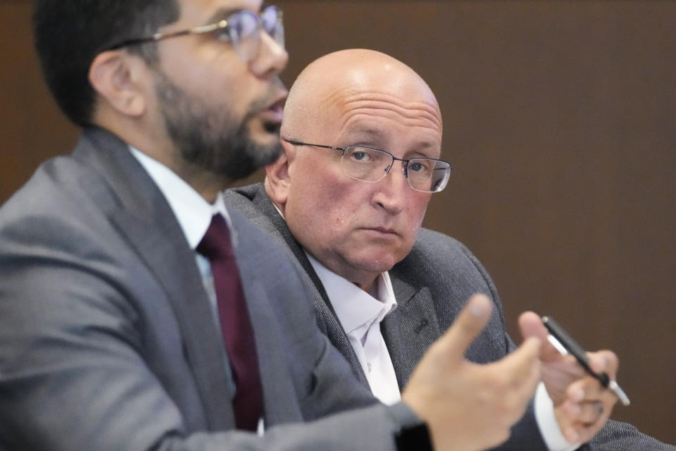 Attorney George Gomez, left, speaks to Judge George D. Strickland as Robert E. Crimo Jr., looks on during an appearance at the Lake County Courthouse, Monday, Aug. 7, 2023, in Waukegan, Ill. (AP Photo/Nam Y. Huh, Pool)