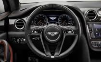 <p>Inside, diamond-quilted seats and other Mulliner-spec materials join the lavish surroundings.</p>