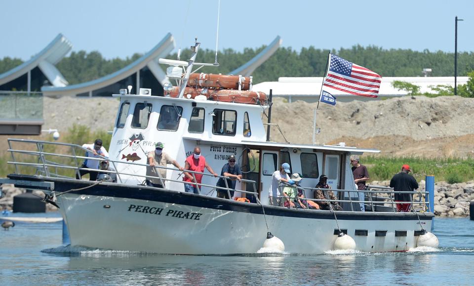 The Perch Pirate fishing charter boat returns from Lake Erie to the East Basin of Dobbins Landing in Erie in this file photo taken in June 2020.