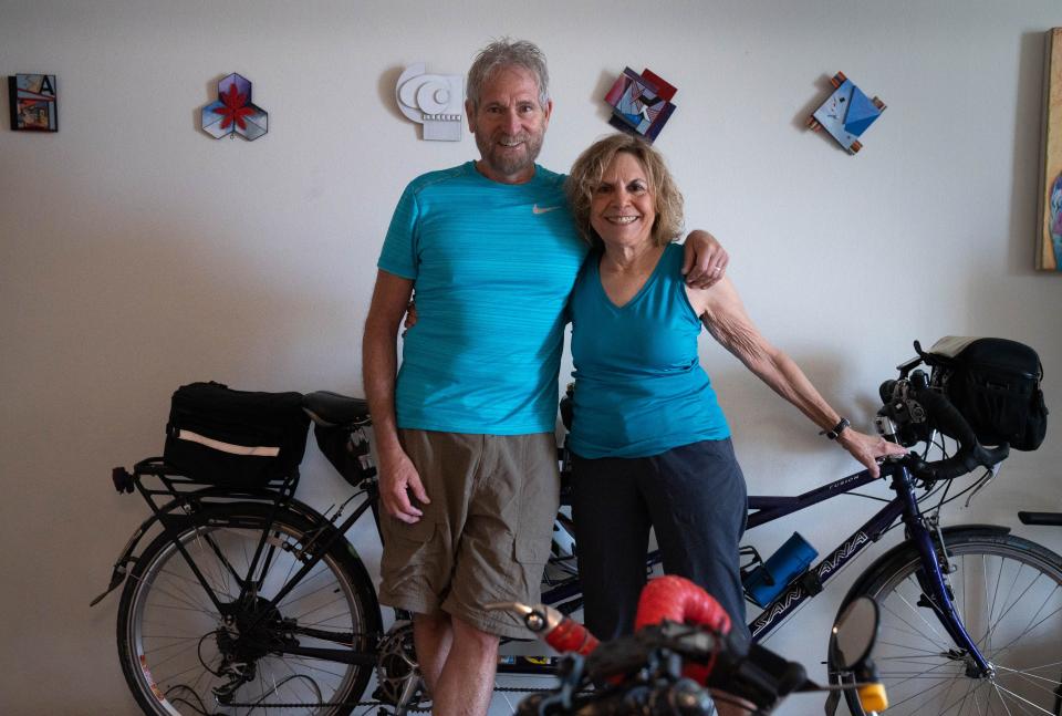 A portrait of David FeBland and his wife, Lynda Mandlawitz, on May 6, 2022, in their home in Phoenix.