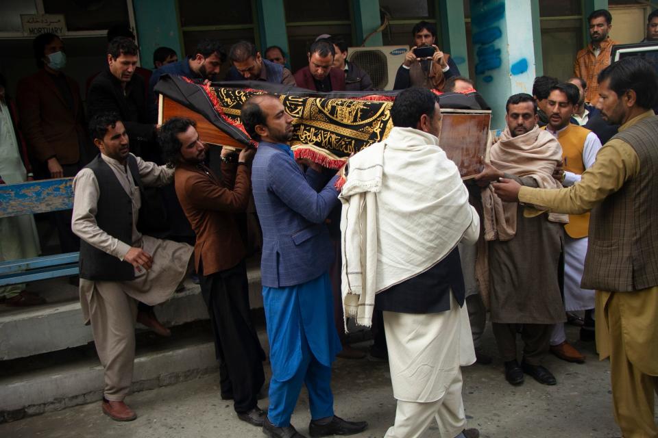 Relatives carry the body of journalist Malala Maiwand who was shot and killed by gunmen soon after she left her house early Thursday, during her funeral ceremony in Jalalabad, east of Kabul, Afghanistan, Thursday, Dec. 10, 2020. No one has claimed responsibility. In addition to working as a TV and radio presenter, Maiwand was also an activist who advocated for the rights of Afghan women and children.