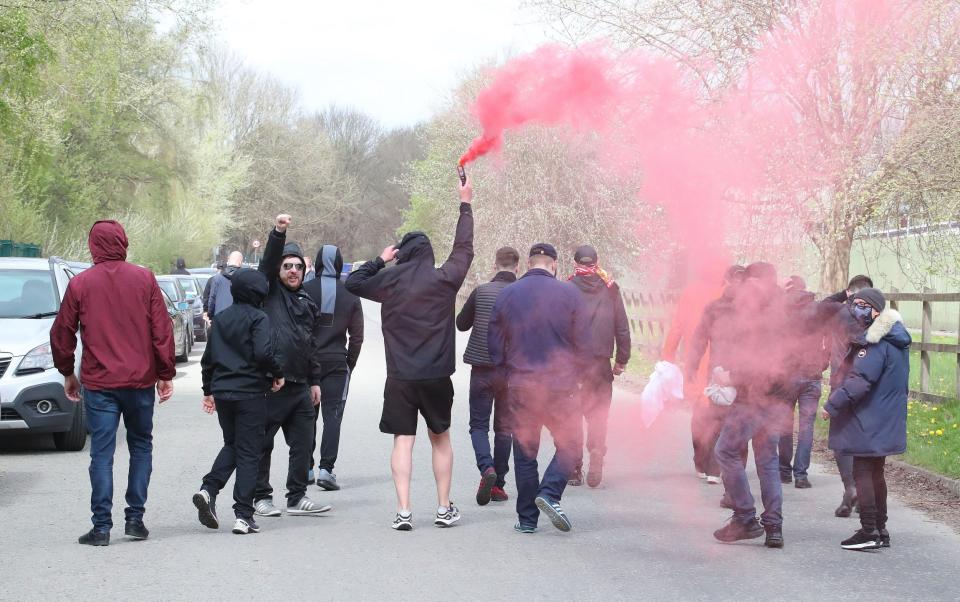 A group of Manchester United fans staged a peaceful protest at The AON Carrington Training Complex on Friday morning and leaft after 2 hours with the team not due into training until after 2.00pm - Eamonn and James Clarke 