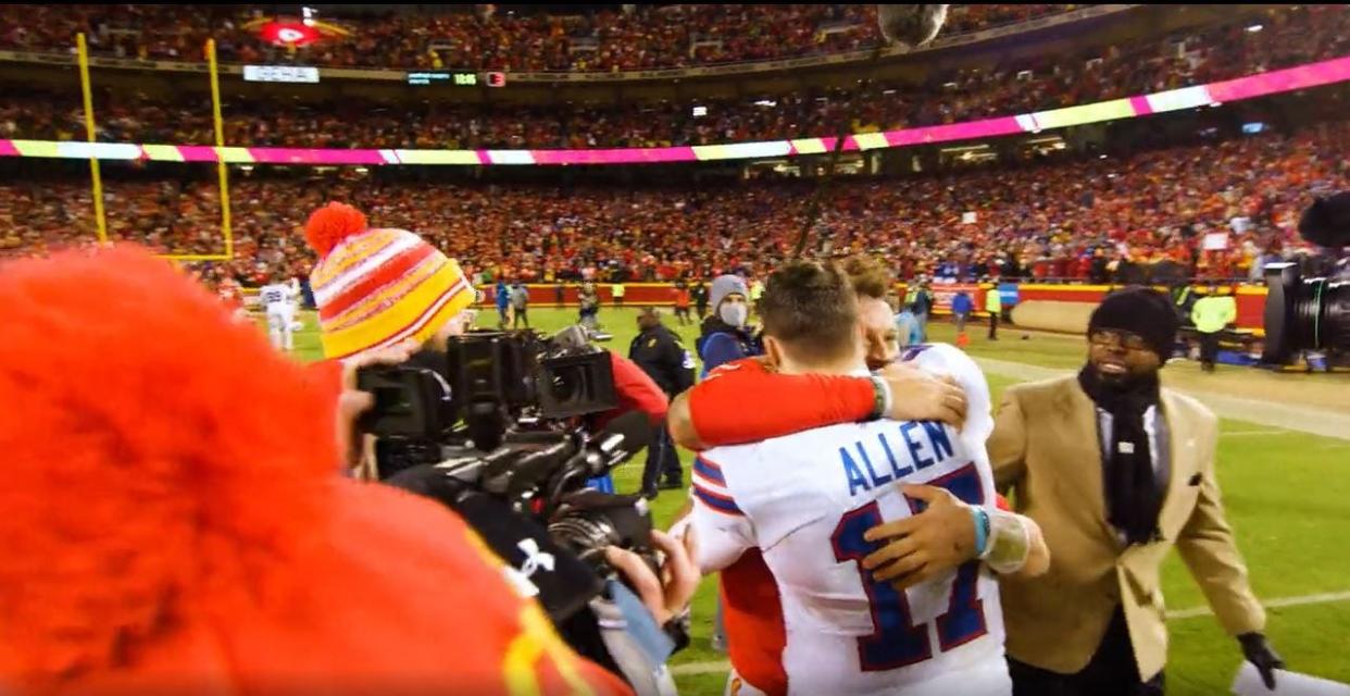 Kansas City quarterback Patrick Mahomes and Buffalo Bills quarterback Josh Allen hug after the Chiefs' 42-36 overtime win in the AFC Divisioanl Round at Arrowhead Stadium on Jan. 23, 2022.