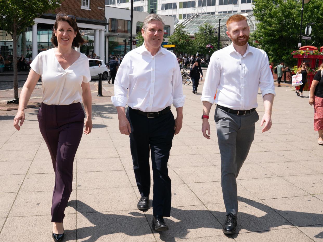 Keir Starmer (centre), shadow chancellor Rachel Reeves and Danny Beales (PA)