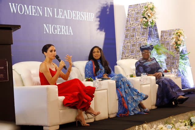 <p> Andrew Esiebo/Getty</p> Meghan Markle speaks at a Women in Leadership event in Abuja, Nigeria