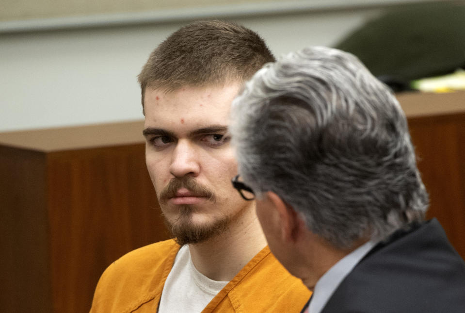 Samuel Woodward talks to his attorney Edward Munoz during a court hearing at the Harbor Justice Center in Newport Beach, Calif., on Wednesday, Aug. 22, 2018. Woodward is charged with the murder of a University of Pennsylvania student Blaze Bernstein. (Paul Bersebach/The Orange County Register via AP, Pool)