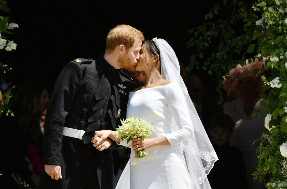 The newlyweds kiss on the West Steps following their marriage service [Photo: Getty]