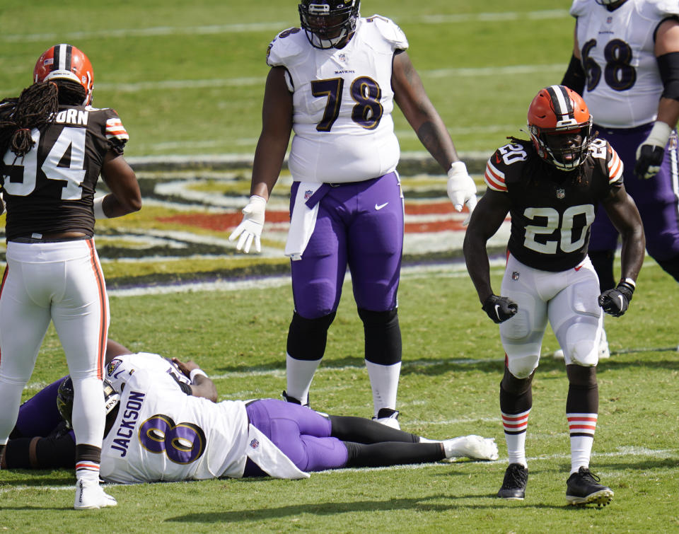 Cleveland Browns cornerback Tavierre Thomas (20) reacts after sacking Baltimore Ravens quarterback Lamar Jackson (8), during the second half of an NFL football game, Sunday, Sept. 13, 2020, in Baltimore, MD. (AP Photo/Julio Cortez)