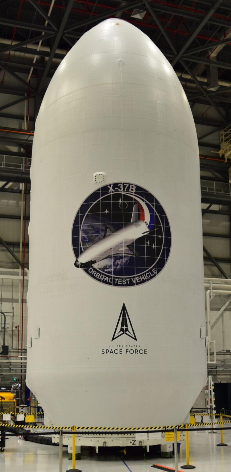 Featuring the U.S. Space Force (USSF) logo for the first time, the encapsulated X-37B Orbital Test Vehicle for the USSF-52 Mission. <em>Boeing via USSF</em>