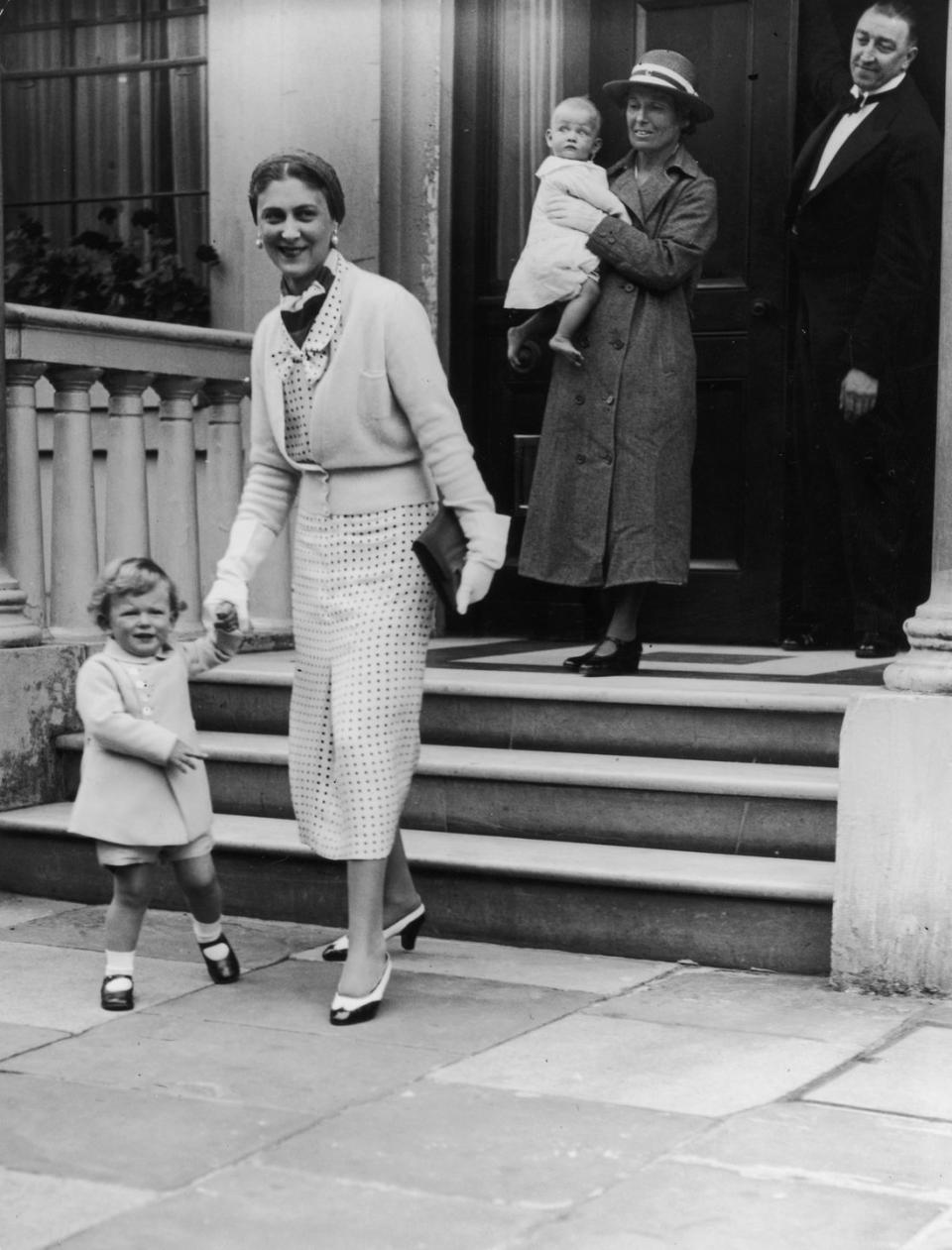 <p>In one of the earliest photos of Princess Alexandra, she is held by a nanny as her mother Princess Marina holds Prince Edward's hand. The family lived in Belgrave Square, London. </p>