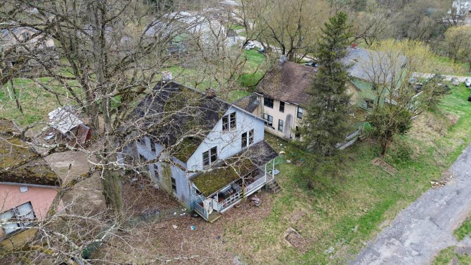 An aerial view of a house in Yellow Dog Village, an abandoned town outside Kittanning, Pennsylvania.