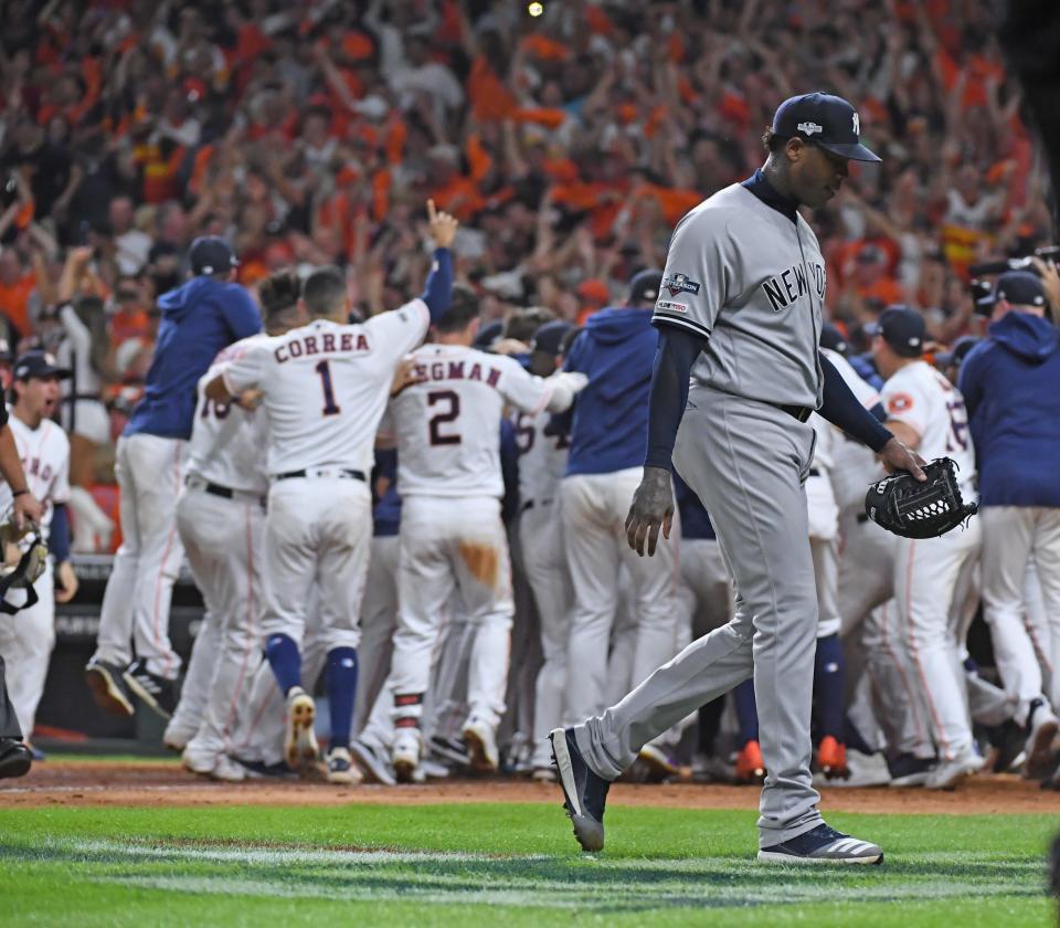 Houston, TX: New York Yankees relief pitcher Aroldis Chapman walks off as the Houston Astros second baseman Jose Altuve hits a two-run home run in the ninth inning of Game 6 of the ALCS on Saturday, Oct. 19, 2019, at Minute Maid Park in Houston, Texas. (Photo by Thomas A. Ferrara/Newsday via Getty Images)