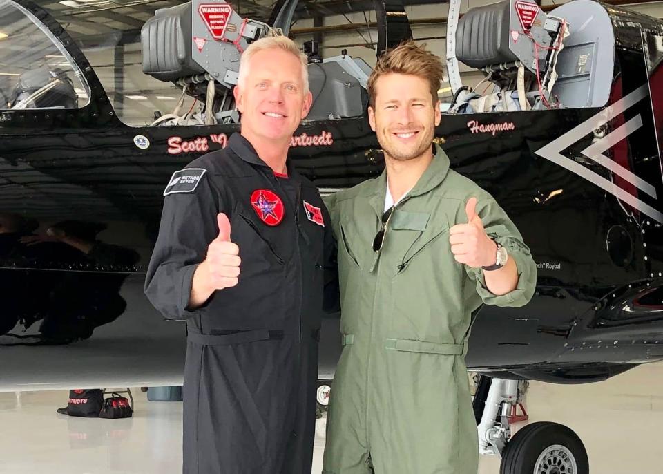 Scott with Glen Powell who played "Hangman" in <em>Top Gun: Maverick </em>in front of his L-39 mount. (Scott"Intake"<br>Kartvedt)