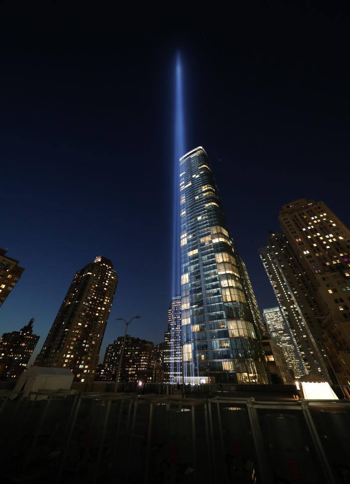 <p>Lights installed on the roof of the Battery Parking Garage, south of the 9/11 Memorial, send twin beams up to four miles into the sky on Sept. 5, 2018. (Photo: Gordon Donovan/Yahoo News) </p>